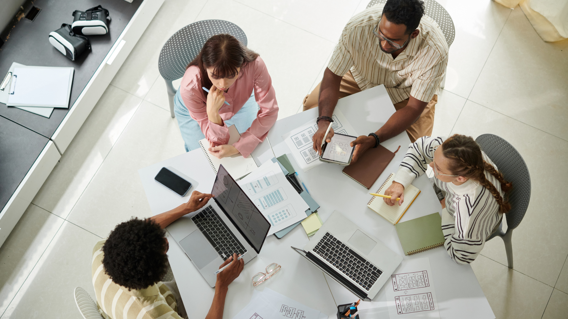 Wisconsin business owner reviewing multi-location payroll records